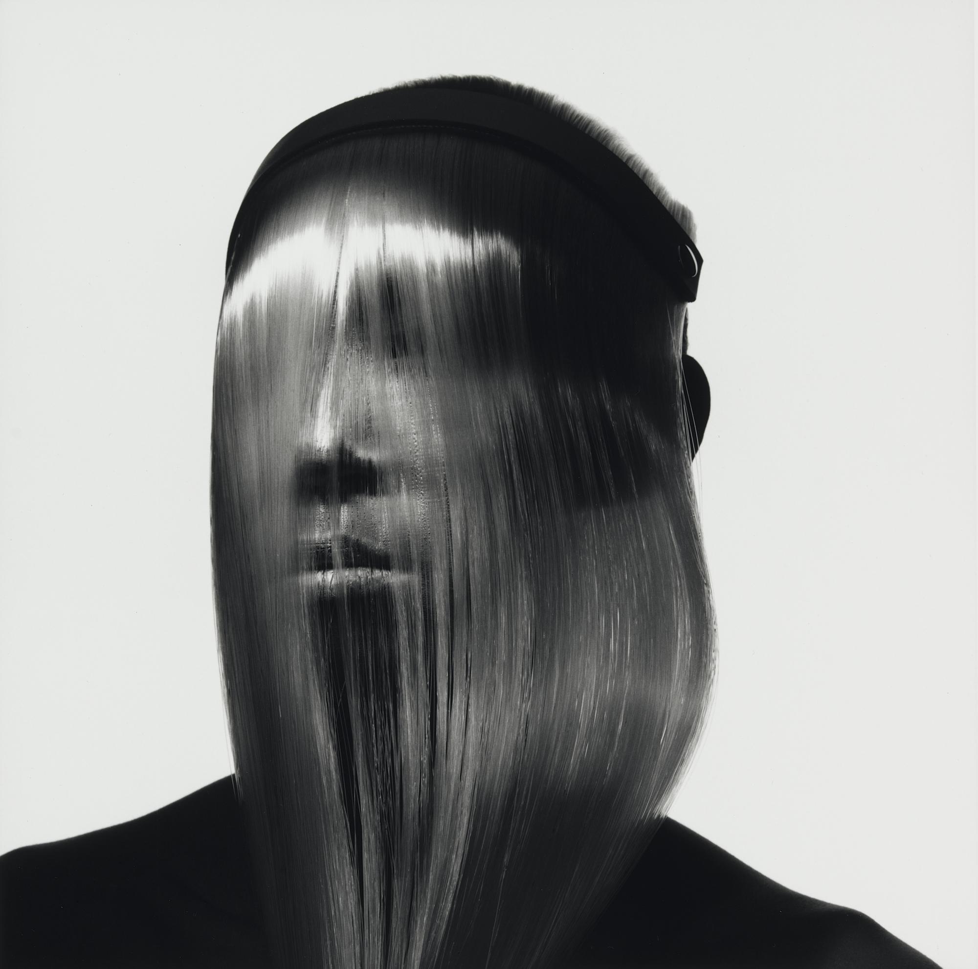 Issey Miyake fashion face covered with hair